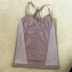 Athleta sport top with removable bra padding. Cross cross back. Size M.